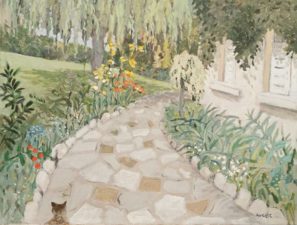 Le petit chat dans l'allée